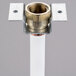 A white metal Hoshizaki water pipe with a brass nut on top.
