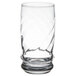 A close-up of a Libbey Cascade clear beverage glass with a spiral design.