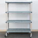 A MetroMax Q metal shelf cart with rubber casters.