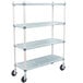 A white MetroMax Q three tiered open grid shelf cart with black rubber casters.