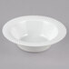 A white Visions plastic bowl with a wavy design.