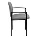A gray Flash Furniture fabric side chair with black legs and arms.