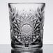 A close up of a Libbey Hobstar Rocks glass with a design on it.