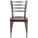 A Flash Furniture metal restaurant chair with a mahogany wood seat.