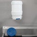 A white polypropylene container with a blue lid.