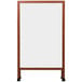 An Aarco cherry wood A-Frame sign board with white marker board.