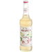 A Monin bottle of Elderflower Flavoring Syrup on a white background.