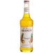 A Monin Premium Pineapple Flavoring syrup bottle.