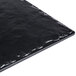 A black rectangular serving platter with a shiny surface.