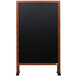A black chalkboard with a wood frame.
