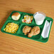 A green Cambro compartment tray with food on it.