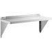 A Regency stainless steel wall shelf with a solid top.
