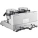 A Carnival King double Belgian waffle maker with silver round containers.