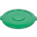 A green plastic lid with a circle.
