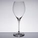 A clear Spiegelau Adina Prestige Bordeaux wine glass on a table.