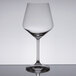 A clear Spiegelau Burgundy wine glass on a reflective surface.