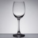 A Spiegelau Soiree white wine glass on a table.