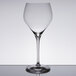 A Spiegelau Adina Prestige Burgundy wine glass on a table.