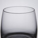 A close up of a clear Spiegelau Vino Grande Rocks Glass with a black rim.