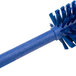 A close-up of a Carlisle blue bottle cleaning brush with bristles.