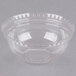 A clear plastic dome lid with a hole on top over a clear bowl.