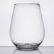 A close-up of a clear Fineline stemless wine goblet.
