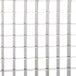 A white rectangular metal grid with squares on it.