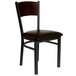 A BFM Seating Dale Sand Black Metal Side Chair with Walnut Finish Wooden Back and Dark Brown Vinyl Seat.
