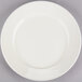 Choice 9 5/8" Ivory (American White) Wide Rim Rolled Edge Stoneware Plate - 12/Pack Main Thumbnail 3