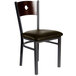 A BFM Seating Darby chair with a walnut wooden back, black frame, and dark brown vinyl seat.