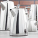 A group of Vollrath Triennium stainless steel coffee and teapots.