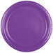 A close-up of a Creative Converting amethyst purple paper plate with a curved edge.