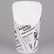 An American Metalcraft paper French fry cup with black and white images on it.