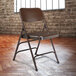 National Public Seating 303 Brown Premium Metal Triple-Brace Folding Chair Main Thumbnail 1