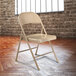National Public Seating 901 Commercialine Beige Metal Folding Chair Main Thumbnail 1