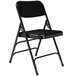 A black National Public Seating metal folding chair.