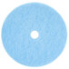A white circle in a blue background with a hole in the middle and a blue circular object inside.