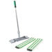 A Unger green and white striped mop with a handle.
