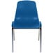A blue plastic chair with chrome legs.