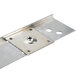 A Master-Bilt metal plate with holes for refrigeration equipment legs.