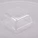 A clear plastic container with a square shape.