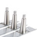 Six stainless steel Master-Bilt refrigeration equipment legs on a white background.