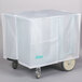 A white plastic covered box on wheels.