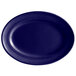 A cobalt blue oval Tuxton china platter with a white background.