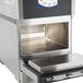 A Merrychef eikon e2s countertop rapid cook oven with the lid open.