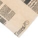 American Metalcraft natural deli sandwich wrap paper with a newspaper print featuring black text.