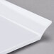 A white GET Melamine platter with a handle.