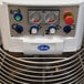 A close up of the control panel on a Globe spiral dough mixer.