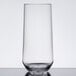 A close up of a clear Via plastic beverage glass.