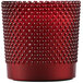 A Sterno wax filled red glass lamp with small dots on it.